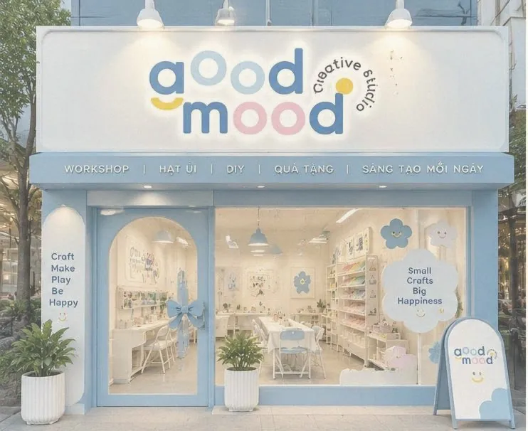 Mặt tiền good mood Creative Studio với tông trắng xanh trời